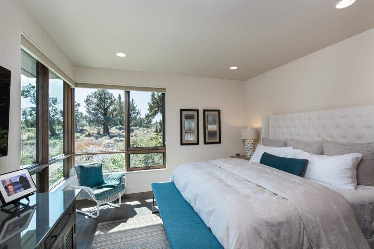 Corner windows brighten the third bedroom.