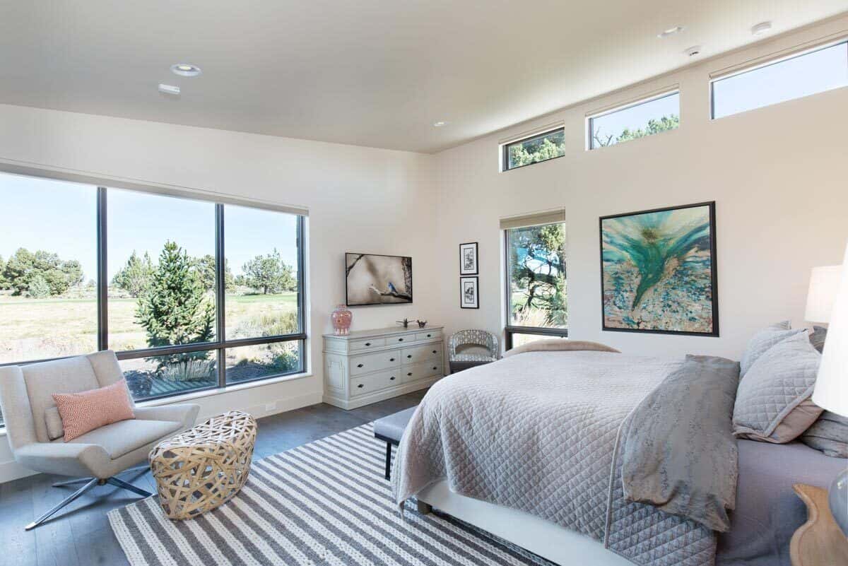 Fourth bedroom with clerestories and a sitting area by the framed window.