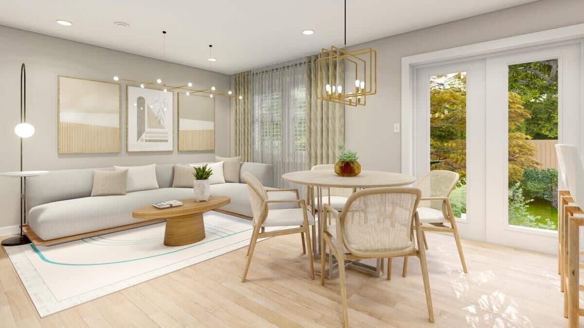 The dining area has a round dining set and direct access to the back patio via sliding glass doors.