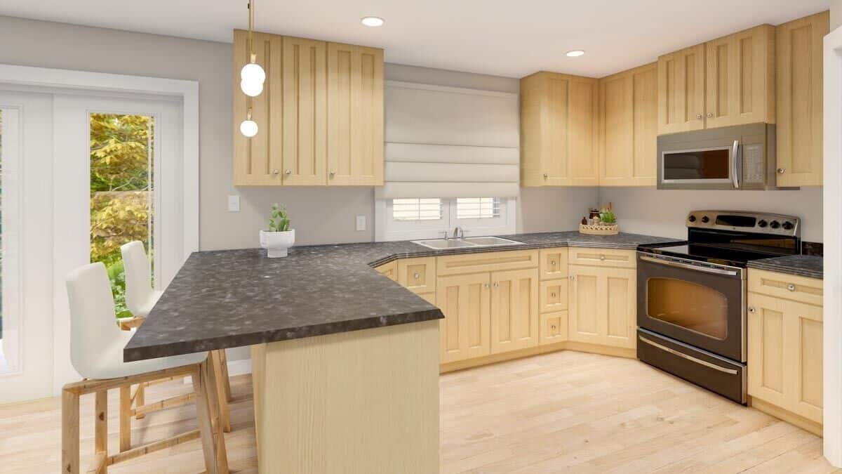A peninsula bar with two seating separates the kitchen from the dining area and family room.