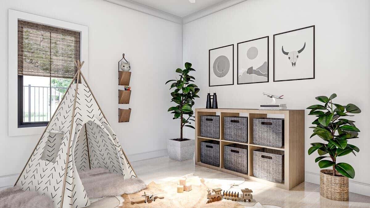 Kid's bedroom with white walls and hardwood floor topped by layered rugs.