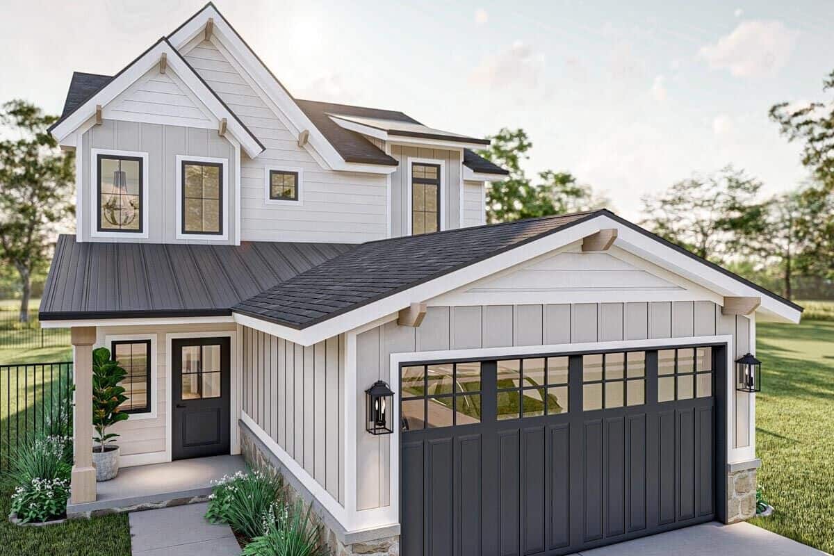 Front-rendering with a double garage and a covered entry porch.