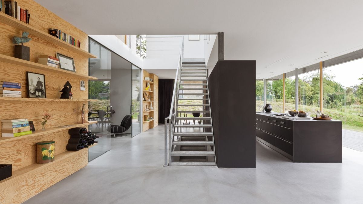 The villa has solar panels on the sedum-covered roof, geothermal energy storage, and a heat pump.