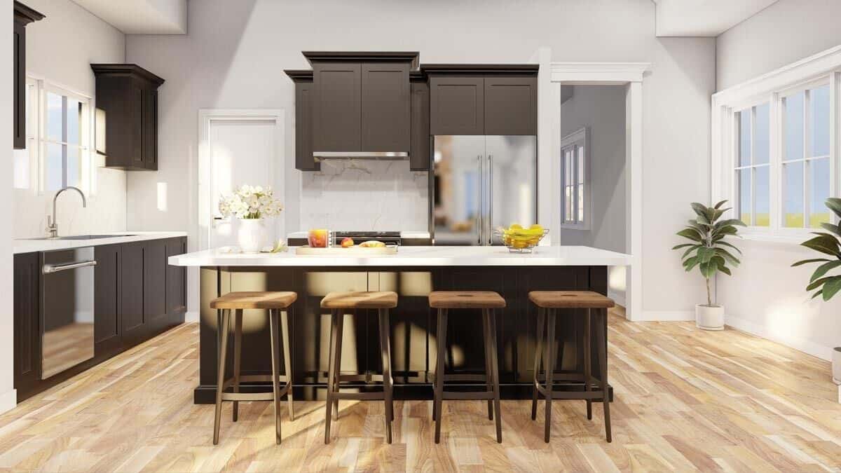 The kitchen features marble countertops, dark cabinets, and a center island lined with wooden bar stools.