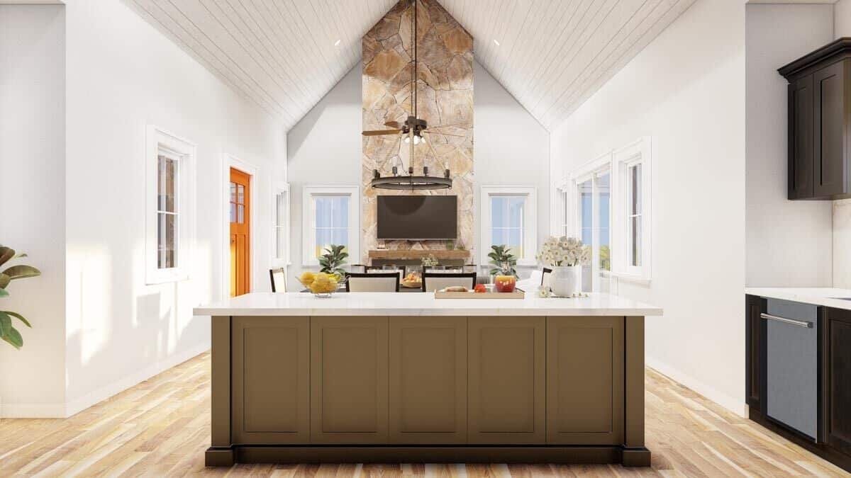 The open living space is crowned with a high cathedral ceiling.