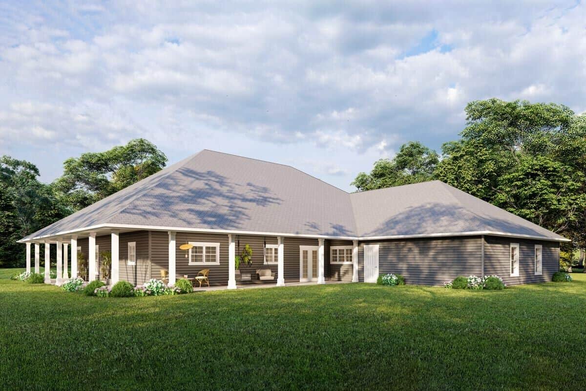 The wraparound porch continues at the back of the home.