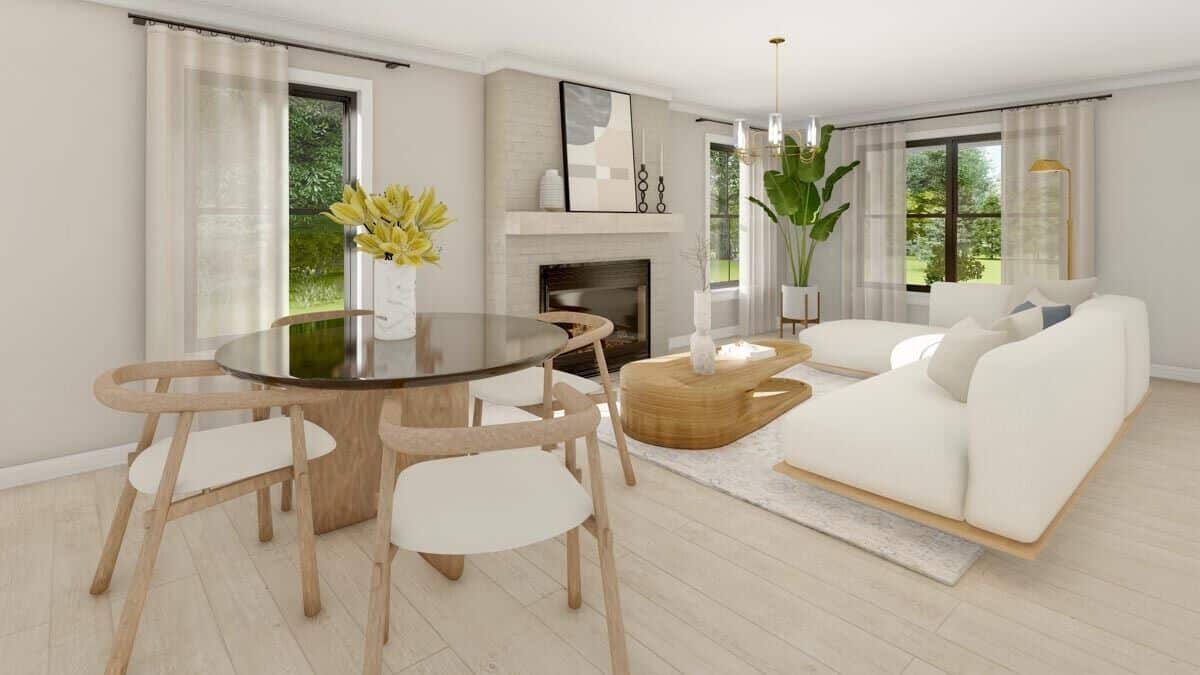 The dining area offers a glass-top dining table and round back chairs.