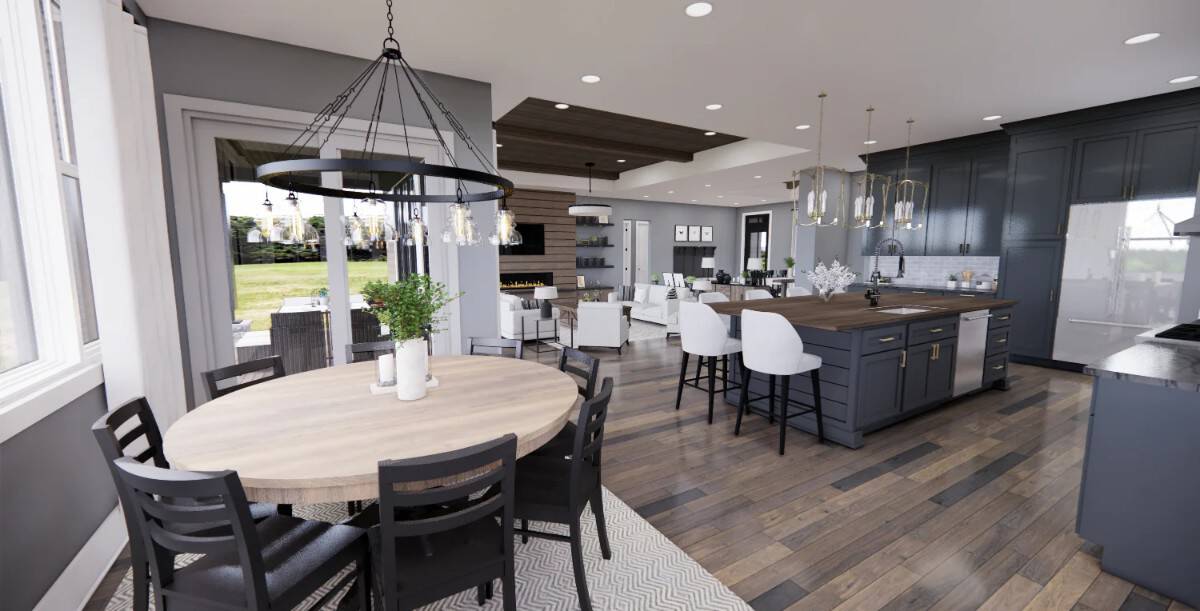 Breakfast nook with a round dining set over a chevron area rug.
