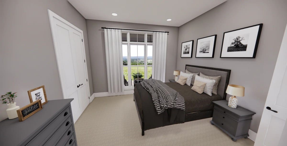 This bedroom has a carpeted floor, a built-in wardrobe, and a view of the front porch.