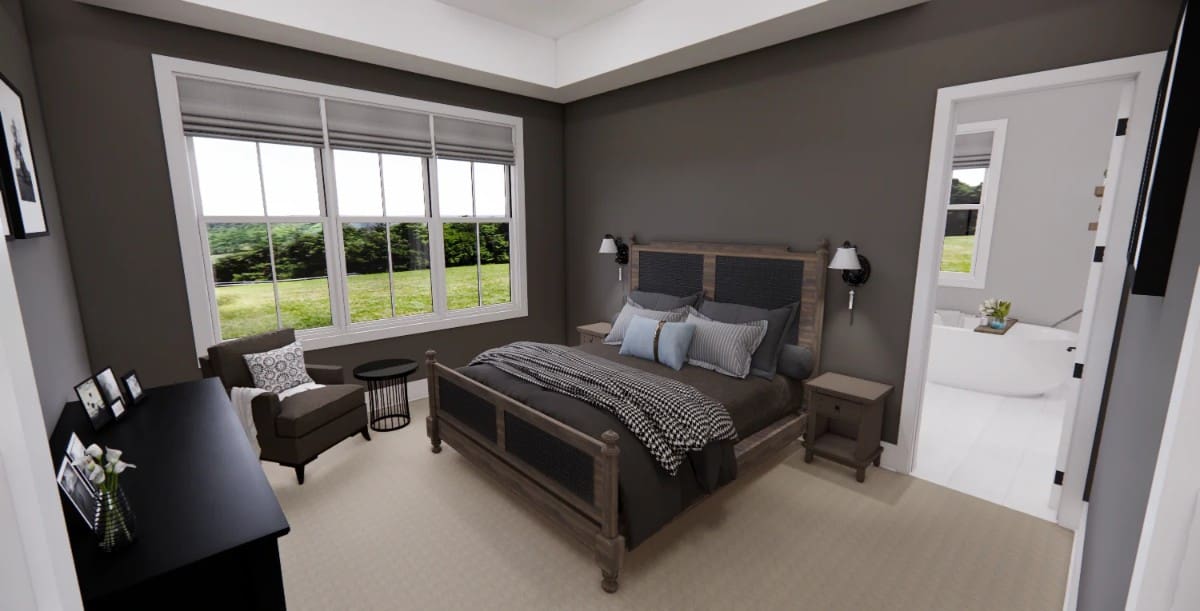 Primary bedroom with a tray ceiling and a private bathroom.