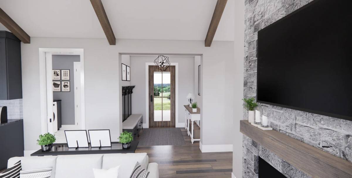 A glazed entry door opens to the foyer with a built-in bench and a wooden console table.