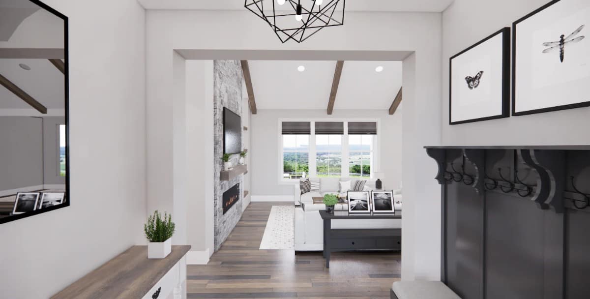 The foyer includes views of the vaulted great room.
