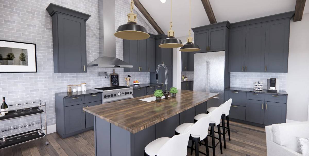 The kitchen features a wood-top island and gray cabinetry fixed against the brick walls.