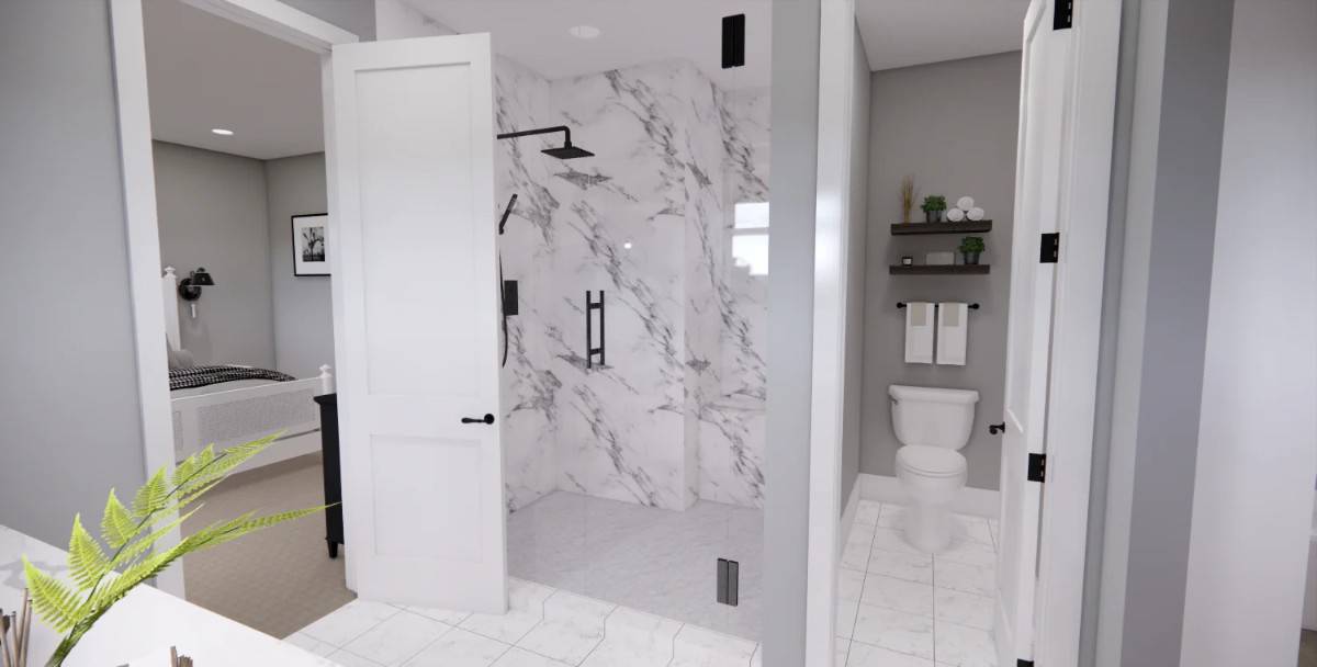 A narrow toilet room completes the primary bathroom.