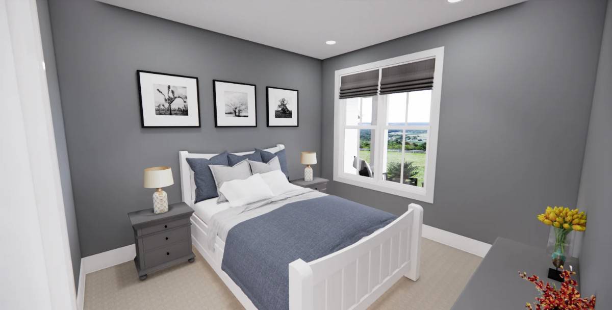 Another bedroom with gray walls adorned by black and white artworks.