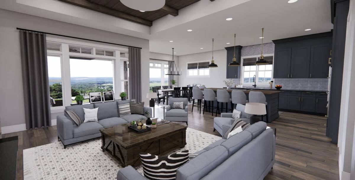 The great room flows seamlessly into the kitchen and bright dining area.