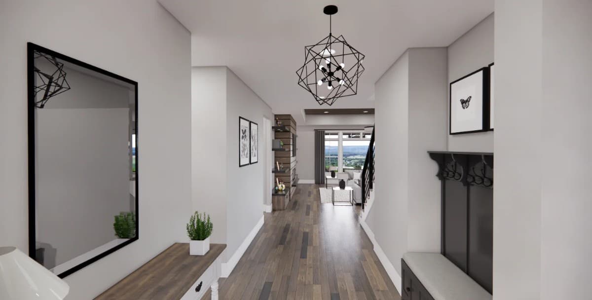 The foyer has a wooden console table, a bench, and views of the great room ahead.