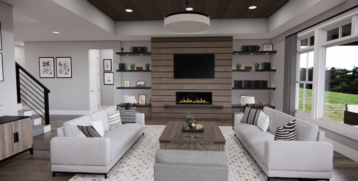 The great room has facing sectionals and a fireplace flanked by wooden built-ins.