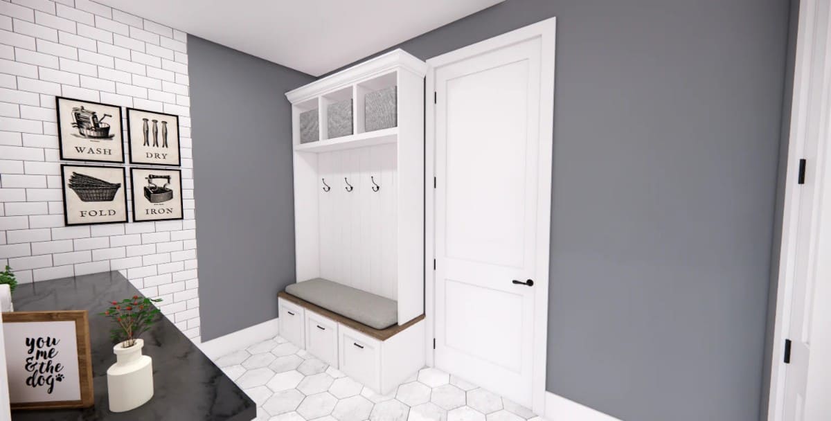 Mudroom with a built-in bench, coat hooks, and storage shelves.