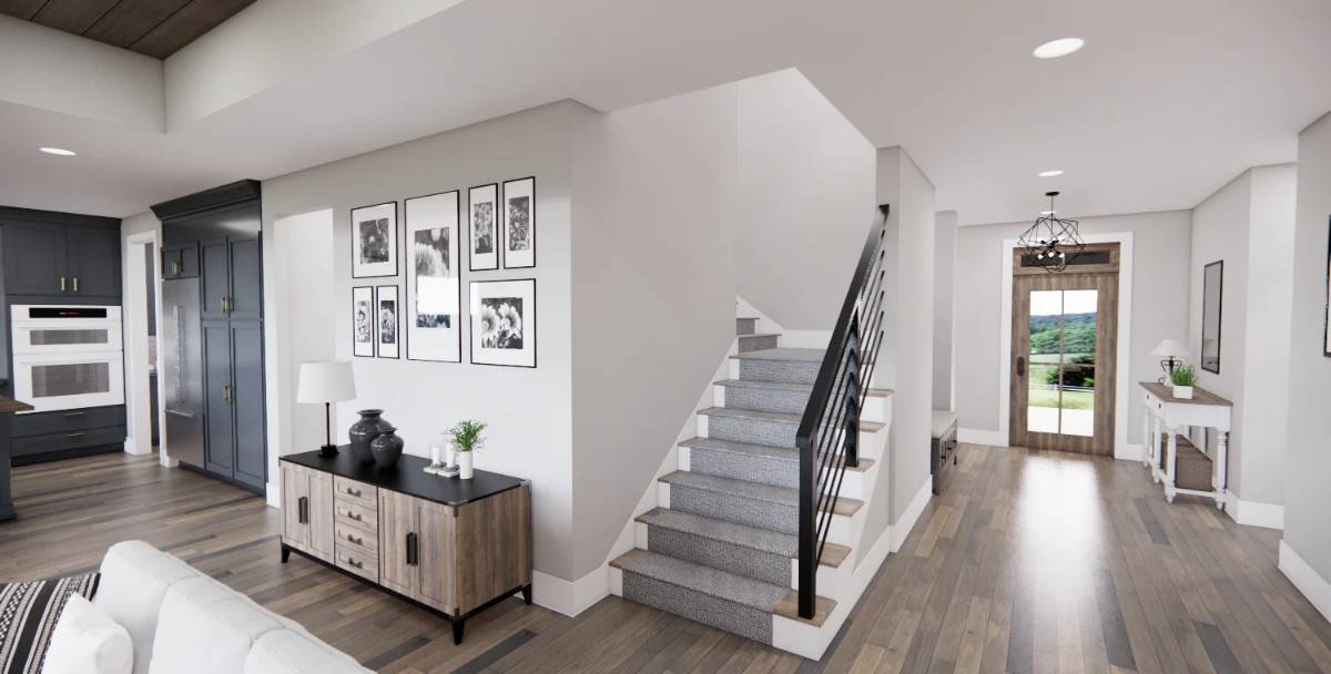 A staircase in the foyer leads to the bonus room upstairs.