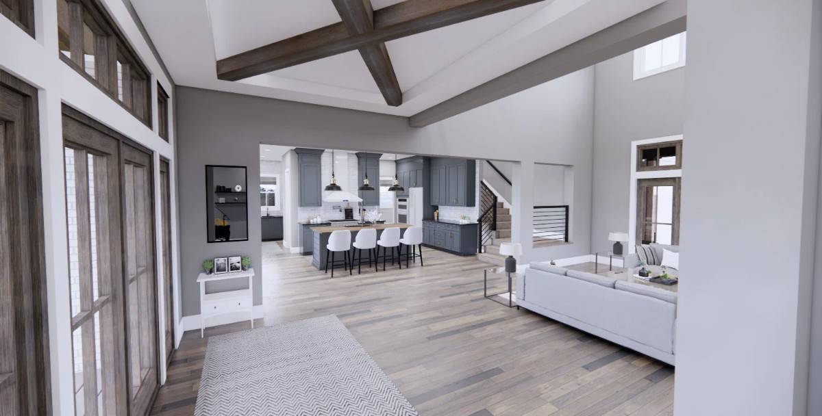 The foyer has sweeping views of the great room and kitchen.
