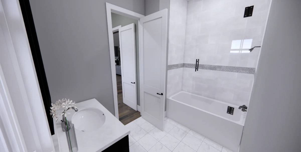 This bathroom offers a sink vanity and a tub and shower combo.