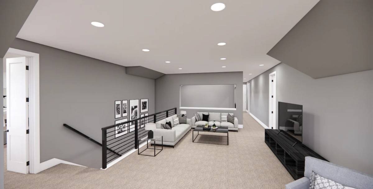 The loft offers modern sofas, metal tables, and a large TV.