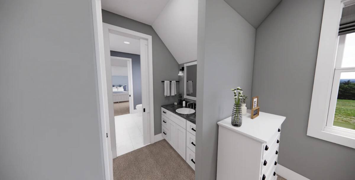 A Jack and Jill bath connects the two bedrooms.