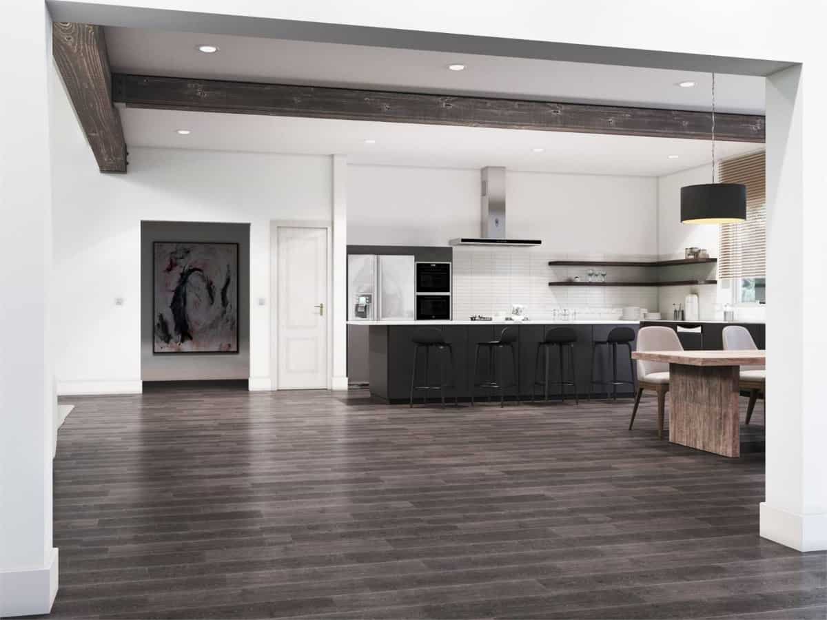 An oversized opening connects the foyer to the open living space.
