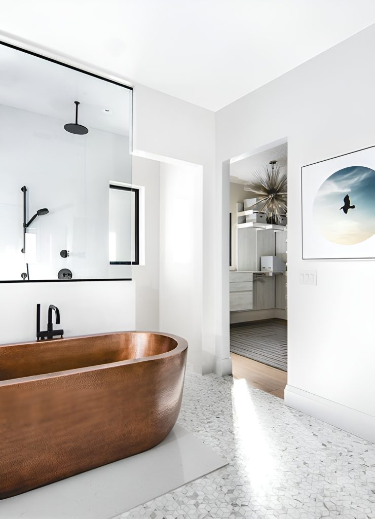 It includes a walk-in shower and a freestanding tub in a copper finish.