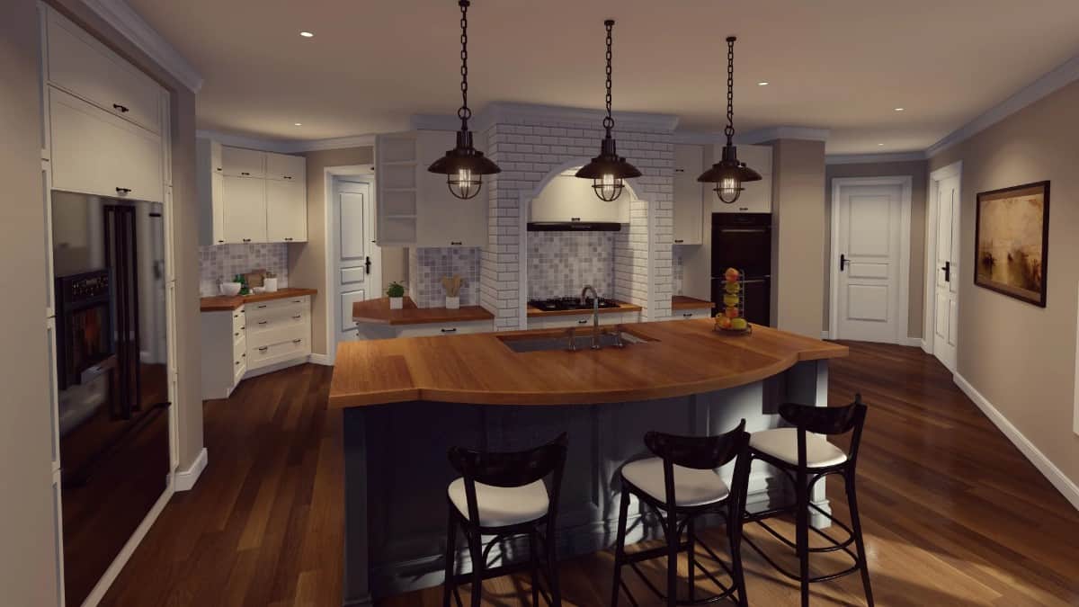 The kitchen offers ample counter space including a large island with a prep sink.