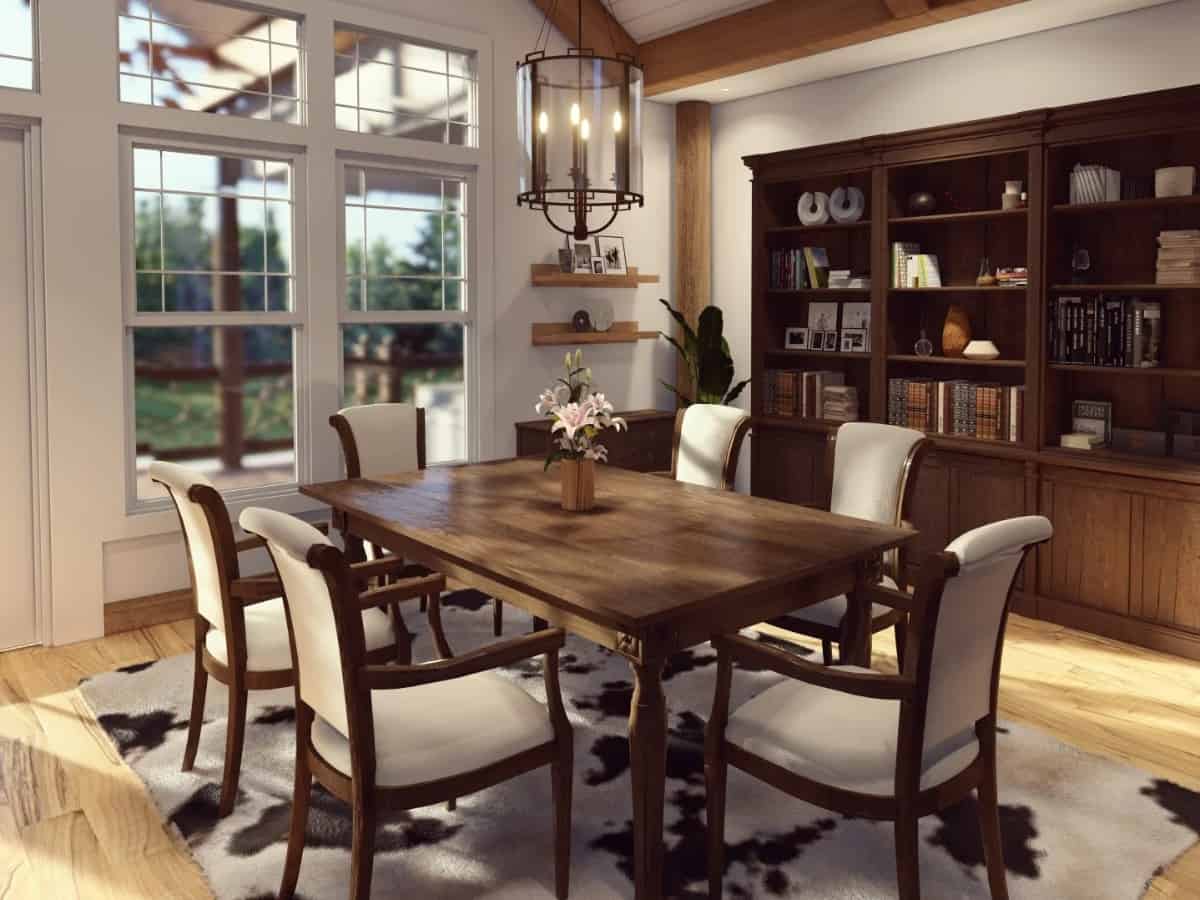 Casual dining with a wooden cabinet and a 6-seater dining set sitting on a cowhide area rug.