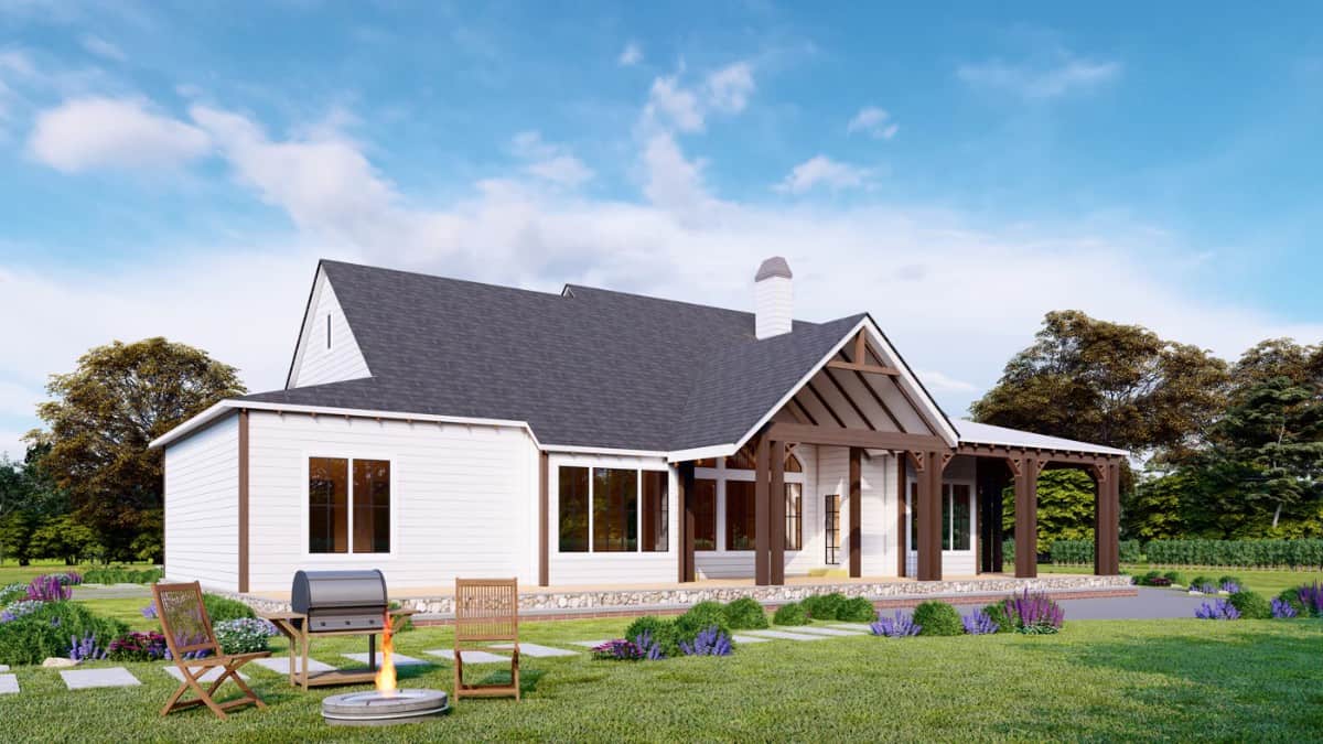 The covered porch wraps around the back side of the home.