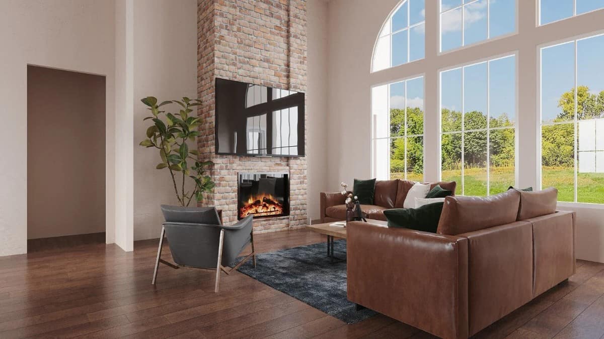 Family room with a large TV, a brick fireplace, and massive windows overlooking the lush backyard.
