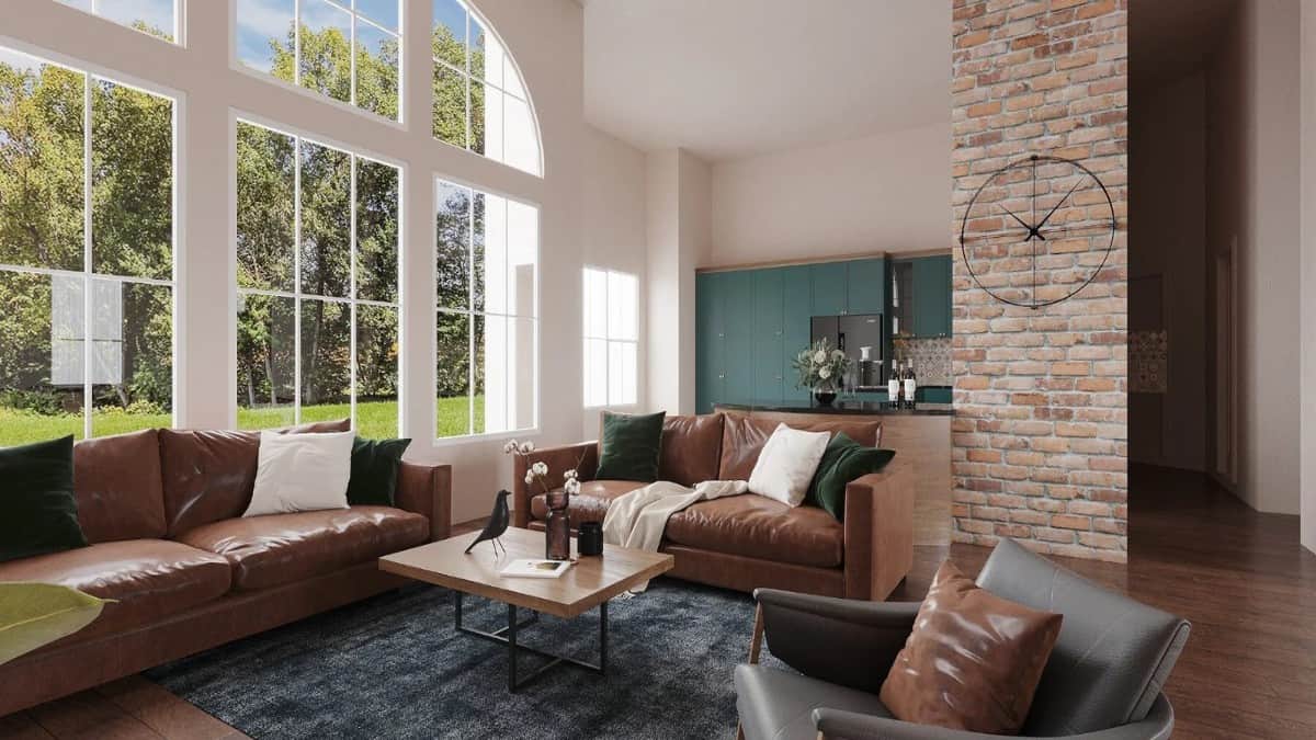 The family room opens completely to the kitchen defined by a peninsula bar.