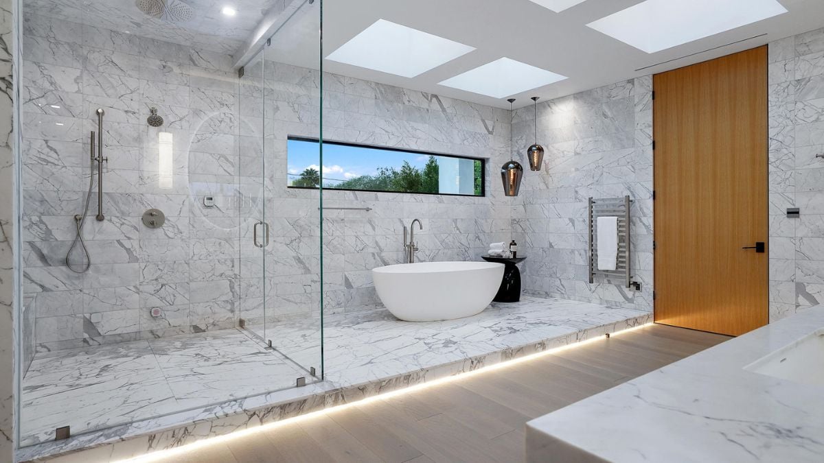 The roomy layout and intelligent design features offer a haven for relaxation and rejuvenation while the clean lines, luxurious materials, and cutting-edge fixtures create a quiet ambiance.