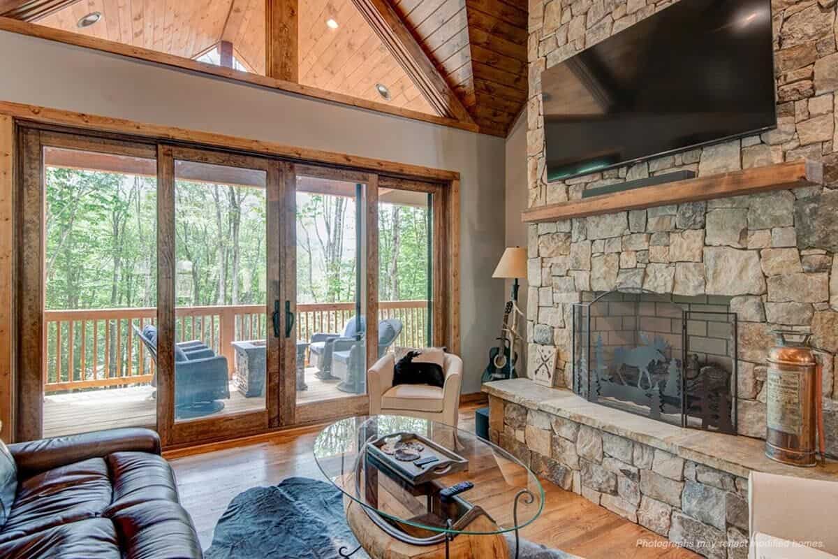 Sliding glass doors at the back extends the living space onto a covered porch.