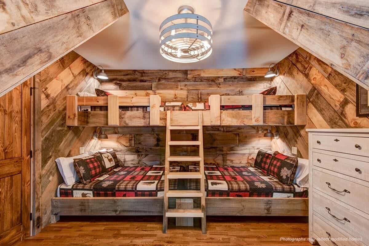 Bunkroom with custom bunk beds and wood-paneled walls.