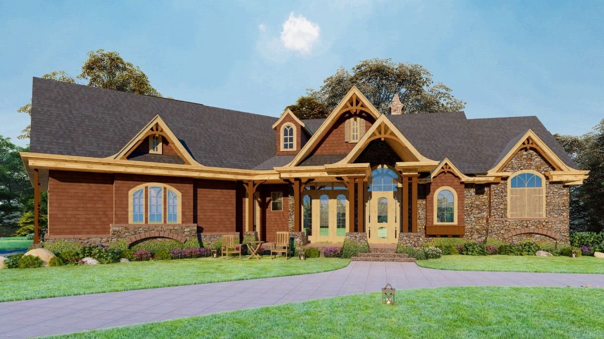Front rendering with stone cladding, cedar shake siding, multiple gables, and a covered entry porch framed with stone base columns.