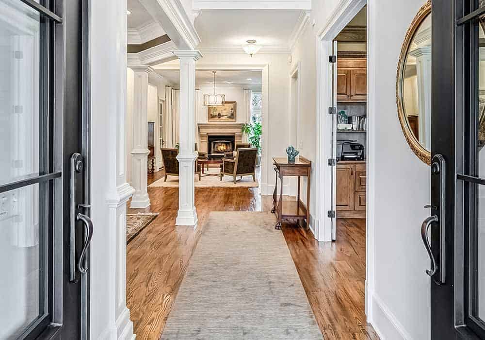 A French front door opens into the foyer.