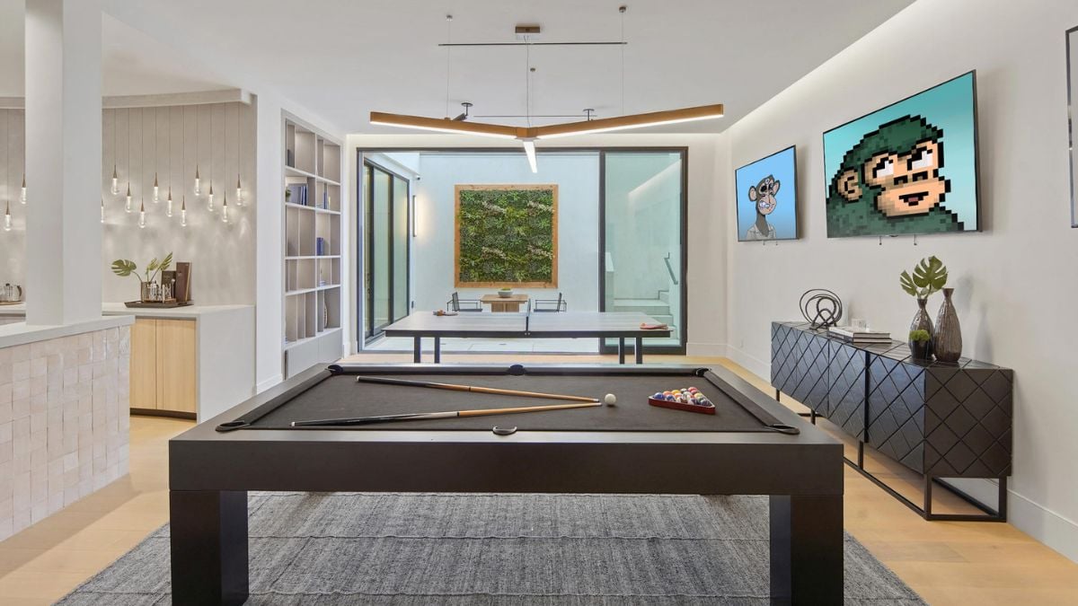 The game room features a custom Pool Table and Ping Pong Table, and a private patio beyond.