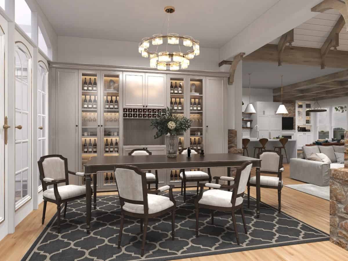 The formal dining room features a dark wood dining set and a built-in wine cabinet.