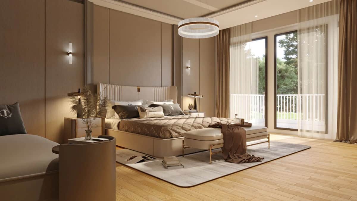 Primary bedroom with private deck access and wood-paneled walls that complement well with the hardwood floor.