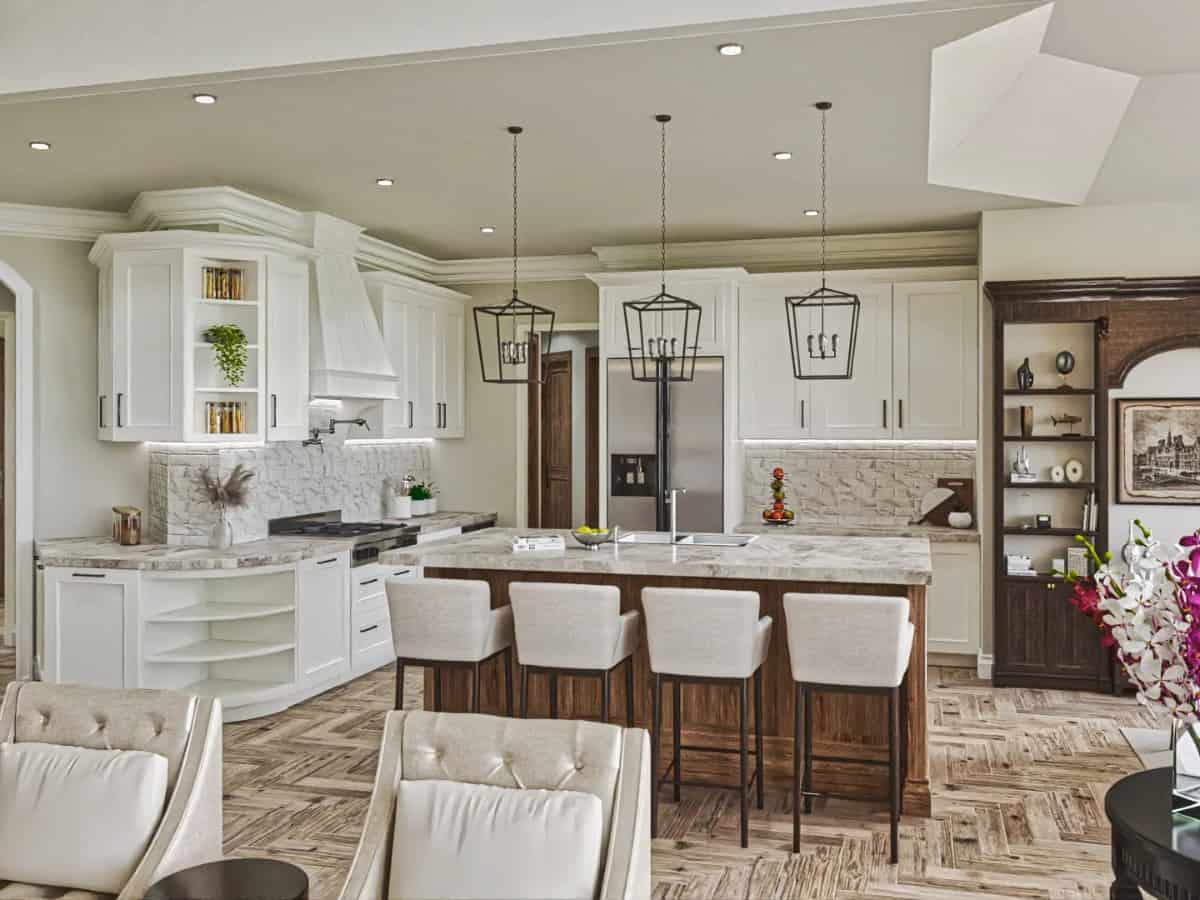 The kitchen has plenty of storage and a breakfast island topped with caged pendants.