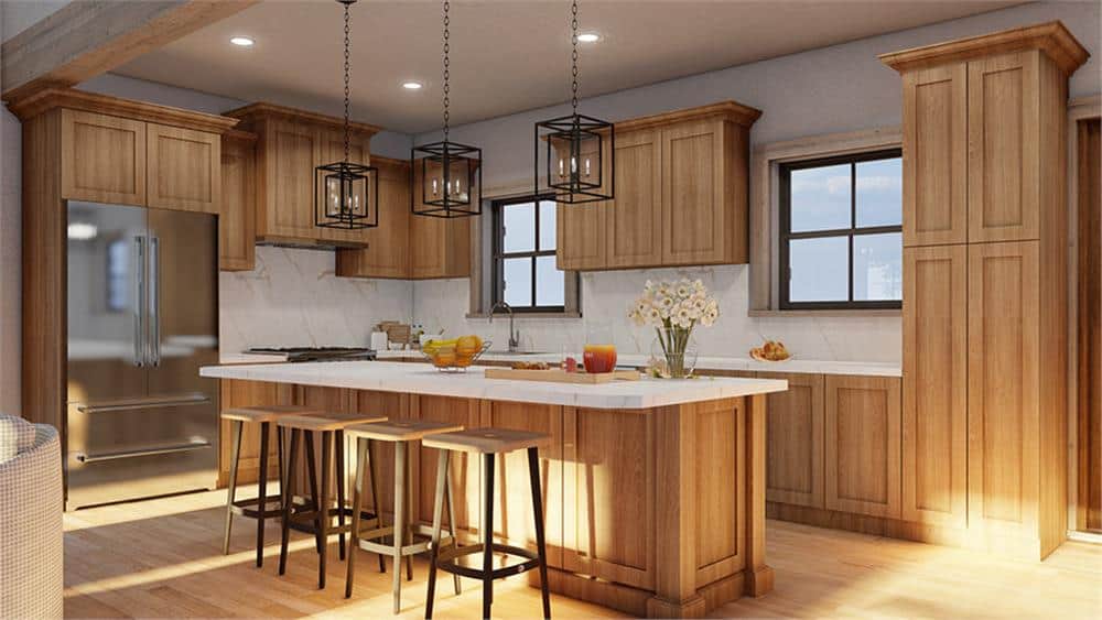 The kitchen is equipped with stainless steel appliances, wooden cabinetry, and a center island.