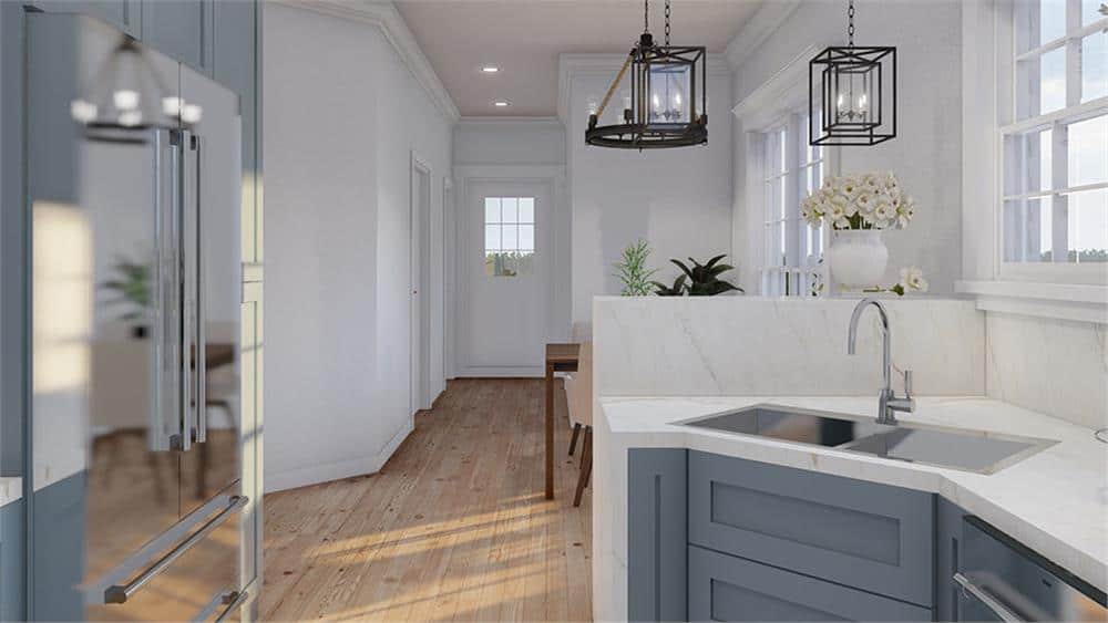 The peninsula bar separates the kitchen from the dining area.