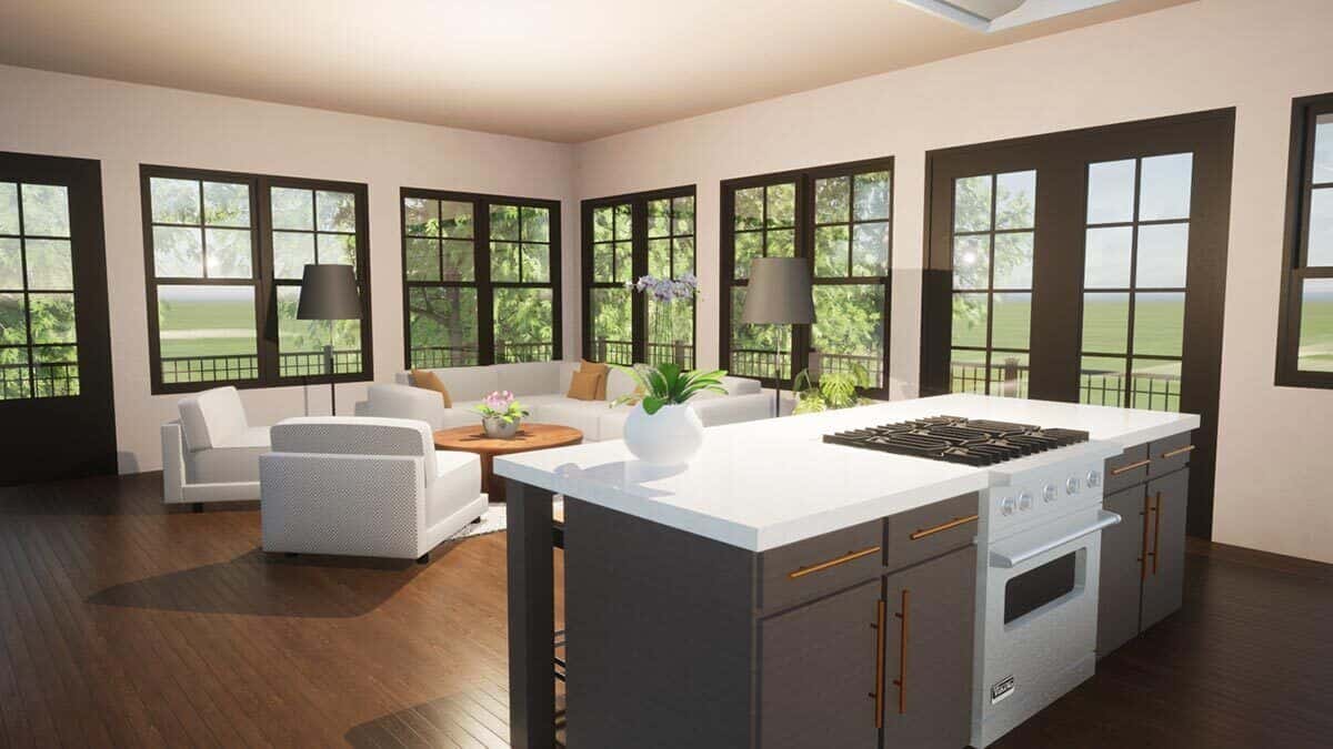 The combined living room and kitchen includes a hardwood floor and surrounding windows that flood the room with abundant natural light.