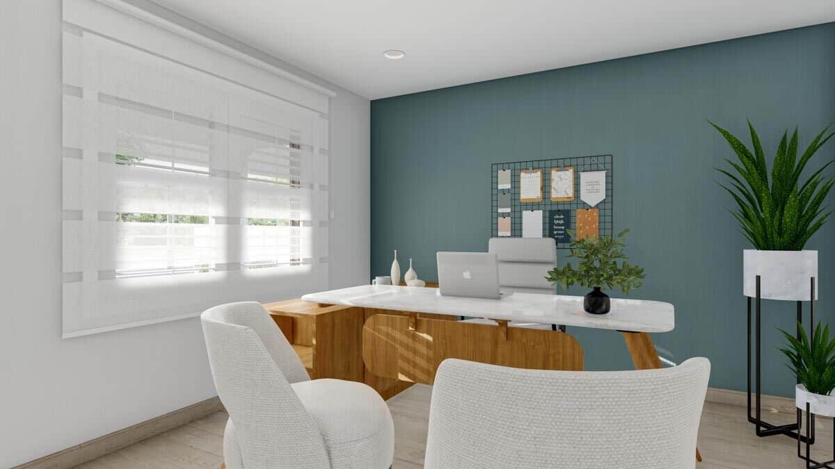 The home office features a sleek desk paired with upholstered chairs.