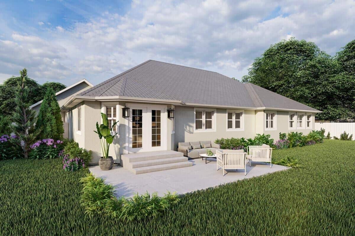 Rear rendering with a French door and an airy patio perfect for lounging.