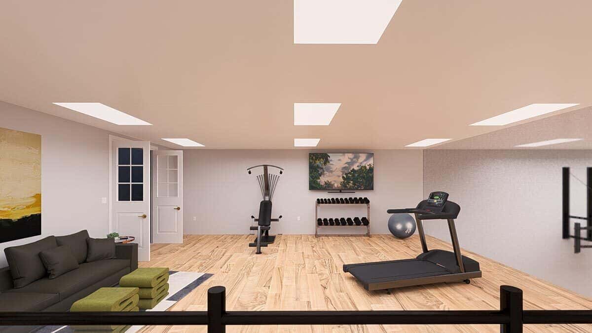 Exercise room with gym equipment and modern furnishings.